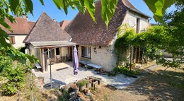 Maison de plain-pied dans village avec commerces